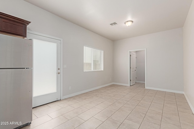 2000 N 36th St Unit 41, Phoenix, AZ 85008 - spare room featuring light tile patterned floors and baseboards