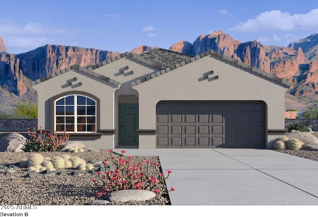10622 W Bloch Rd, Tolleson, AZ 85353 - view of front of house with an attached garage, a mountain view, driveway, and a tiled roof