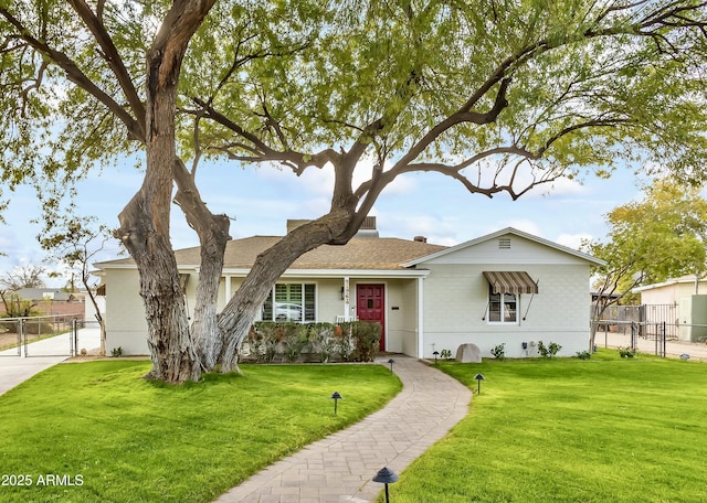 ranch-style house with a front yard