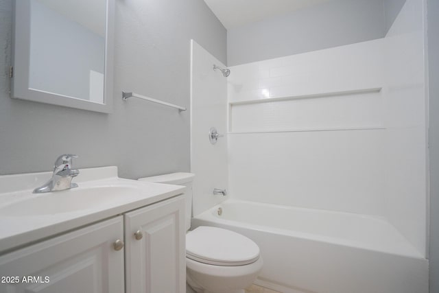 bathroom with vanity, toilet, and shower / washtub combination