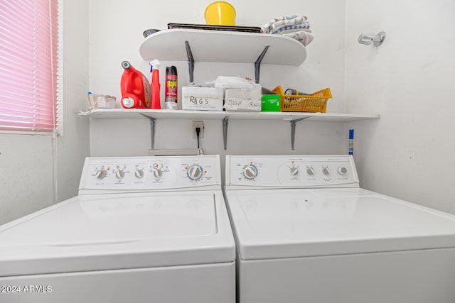 laundry area with separate washer and dryer