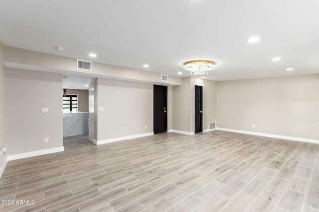 basement with light wood-type flooring