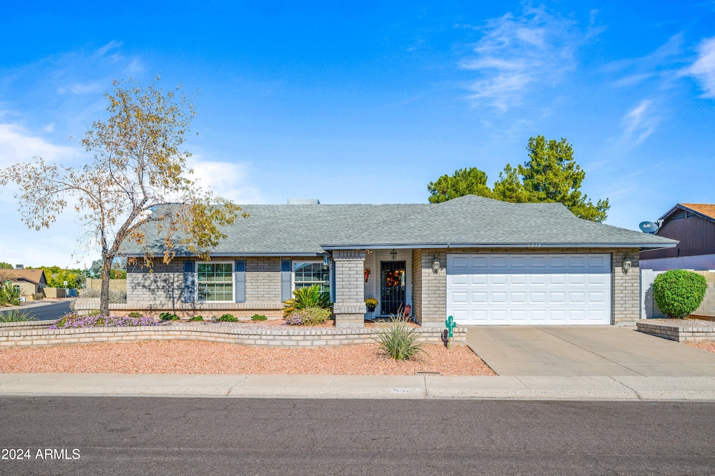 ranch-style house with a garage