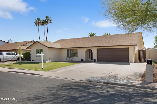 2329 S Elm, Mesa, AZ 85202 - ranch-style home featuring a garage, driveway, brick siding, a gate, and a shingled roof