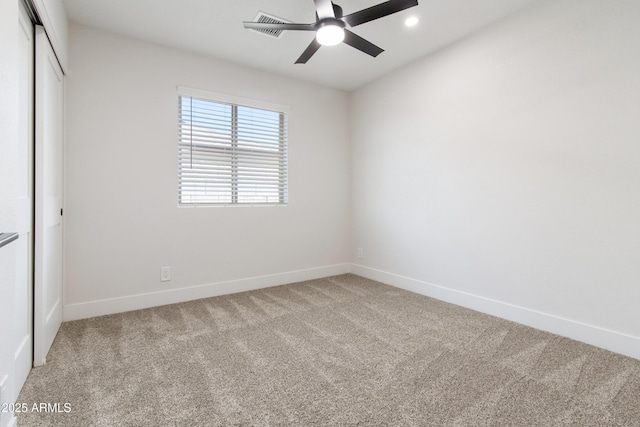 2329 S Elm, Mesa, AZ 85202 - unfurnished bedroom featuring carpet floors, a closet, baseboards, and a ceiling fan