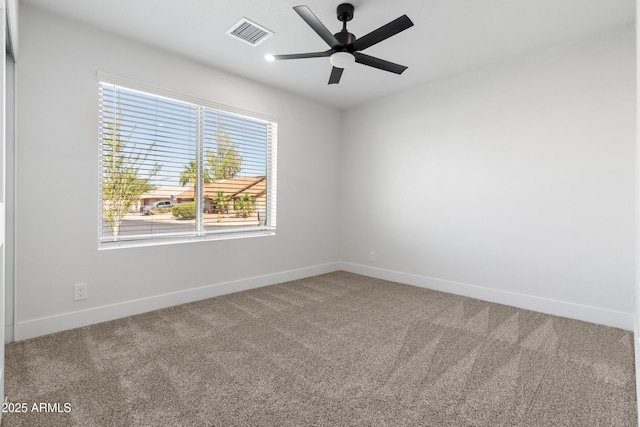 2329 S Elm, Mesa, AZ 85202 - carpeted spare room featuring baseboards and ceiling fan