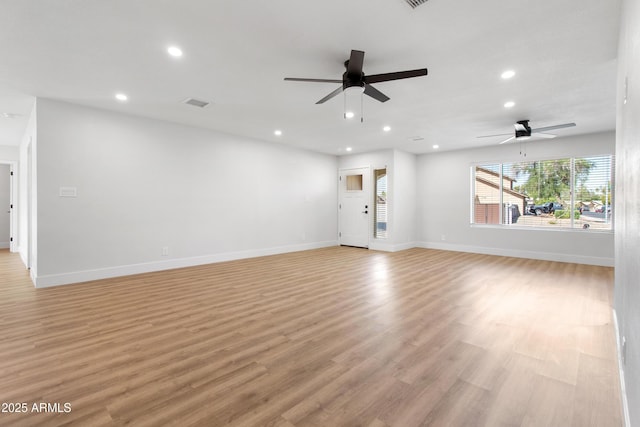 2329 S Elm, Mesa, AZ 85202 - unfurnished living room with ceiling fan, recessed lighting, light wood finished floors, and baseboards
