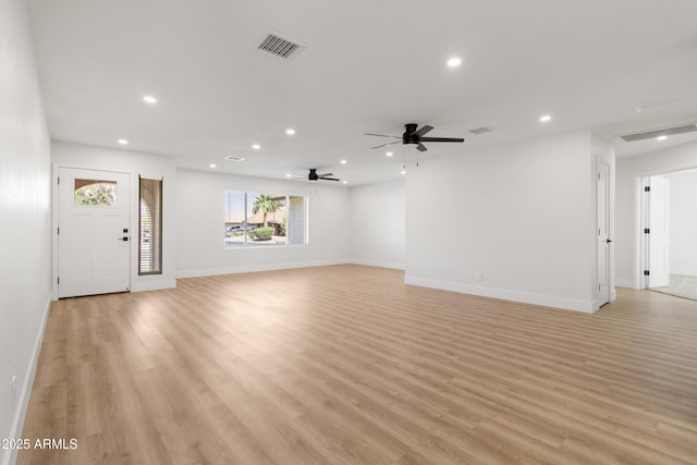 2329 S Elm, Mesa, AZ 85202 - unfurnished living room with recessed lighting, light wood finished floors, ceiling fan, and baseboards