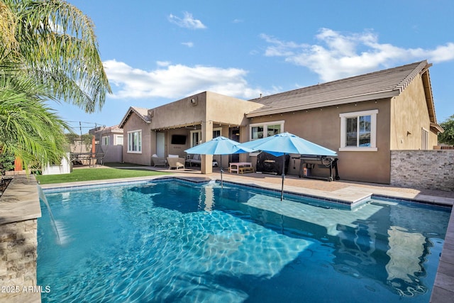 view of pool with a patio and a fenced in pool