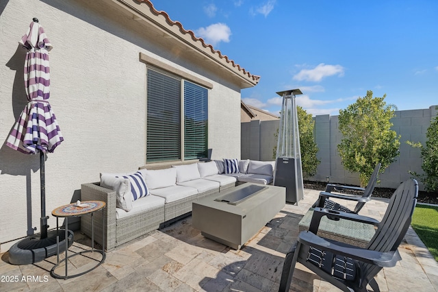 view of patio / terrace featuring a fenced backyard and an outdoor hangout area