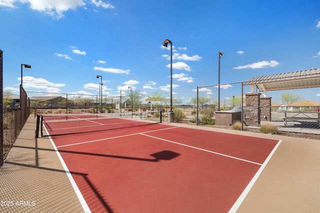 view of sport court with community basketball court and fence