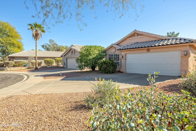 view of front of property featuring a garage