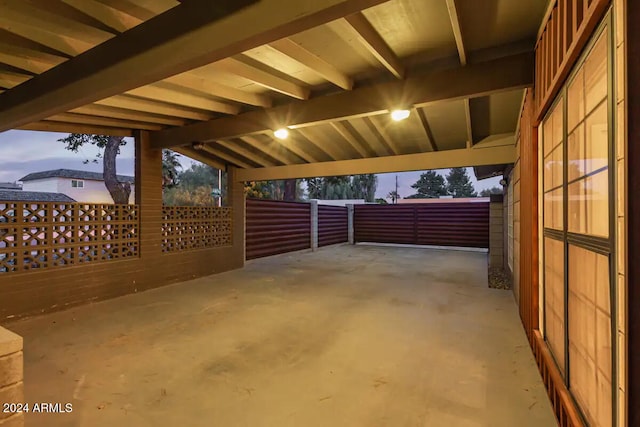 view of patio terrace at dusk