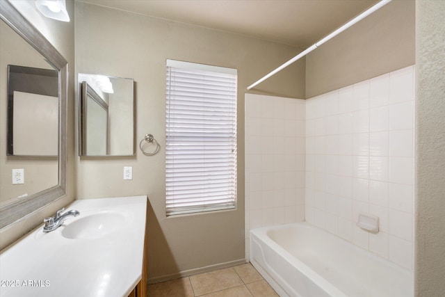 bathroom featuring baseboards, shower / tub combination, vanity, and tile patterned floors