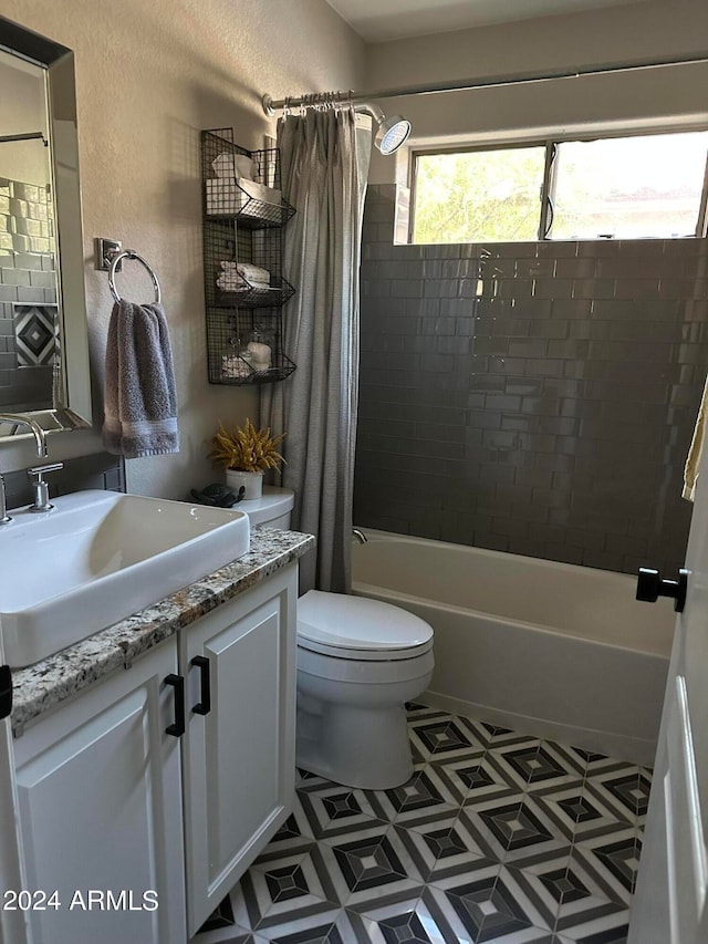 full bathroom featuring vanity, toilet, and shower / bath combo