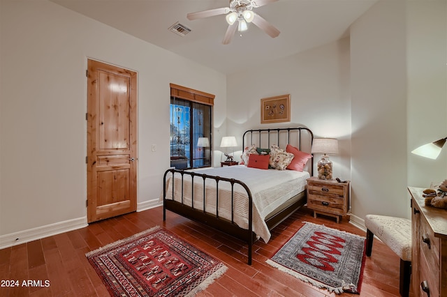 bedroom with wood-type flooring and ceiling fan