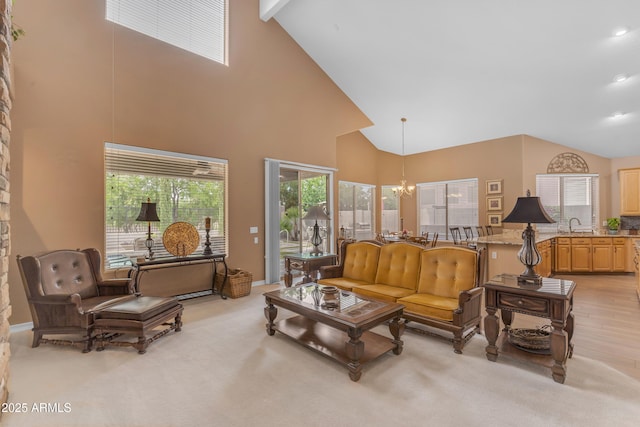 9702 E Naranja Ave, Mesa, AZ 85209 - living area featuring high vaulted ceiling, a chandelier, beam ceiling, and baseboards