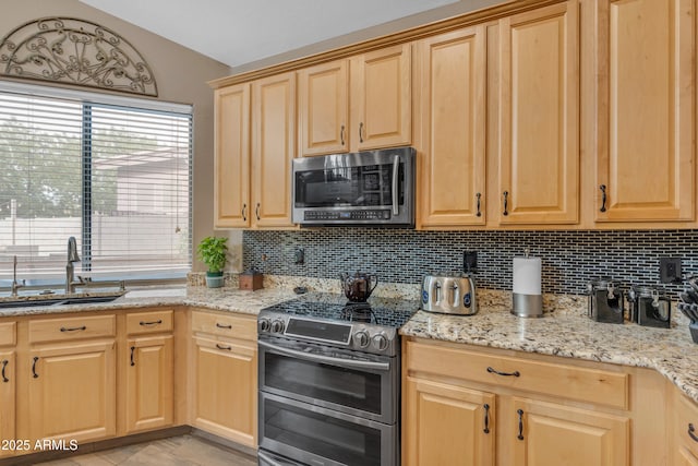 9702 E Naranja Ave, Mesa, AZ 85209 - kitchen featuring appliances with stainless steel finishes, a sink, light brown cabinetry, and decorative backsplash