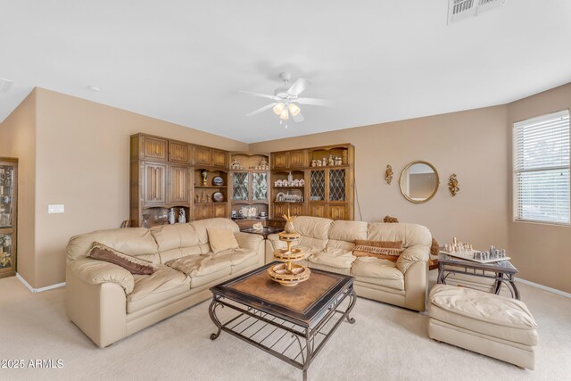 9702 E Naranja Ave, Mesa, AZ 85209 - living room with a ceiling fan, baseboards, and light colored carpet