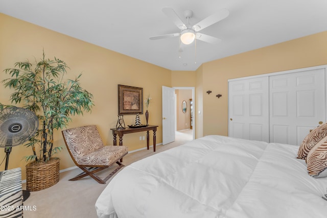 9702 E Naranja Ave, Mesa, AZ 85209 - bedroom with light colored carpet, a closet, and a ceiling fan