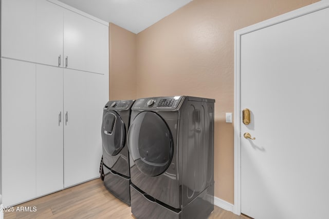 9702 E Naranja Ave, Mesa, AZ 85209 - washroom with independent washer and dryer, light wood-type flooring, and baseboards