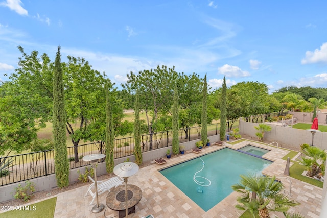 9702 E Naranja Ave, Mesa, AZ 85209 - view of swimming pool with a patio, a fenced backyard, a pool with connected hot tub, and view of wooded area