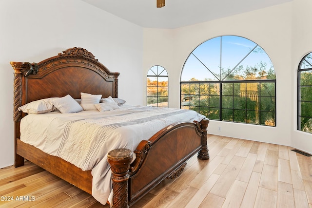 bedroom featuring ceiling fan and light wood-type flooring