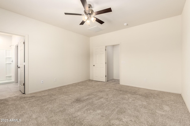 24627 W Ripple Rd, Buckeye, AZ 85326 - empty room featuring light carpet, a ceiling fan, and a smoke detector