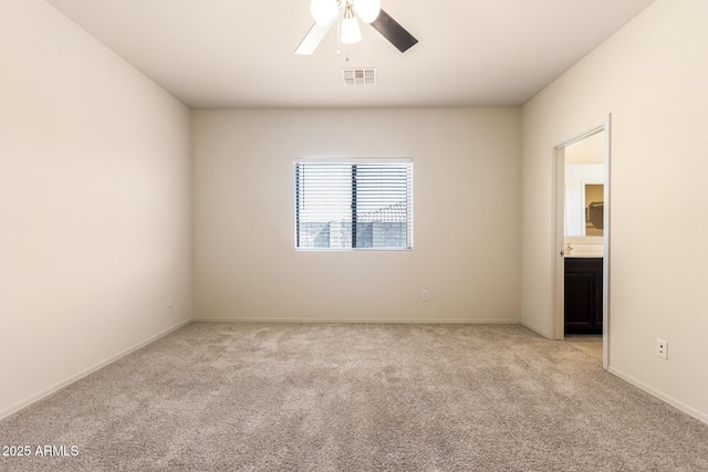 24627 W Ripple Rd, Buckeye, AZ 85326 - spare room with light colored carpet and ceiling fan