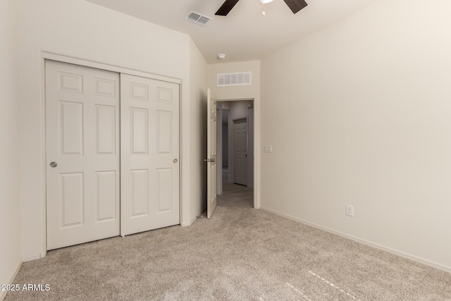 24627 W Ripple Rd, Buckeye, AZ 85326 - unfurnished bedroom with carpet flooring, a closet, and ceiling fan