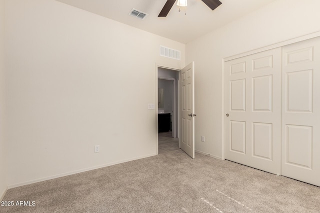 24627 W Ripple Rd, Buckeye, AZ 85326 - unfurnished bedroom featuring carpet floors, ceiling fan, and a closet