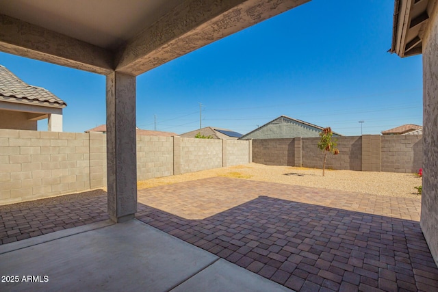 24627 W Ripple Rd, Buckeye, AZ 85326 - fenced backyard featuring a patio area