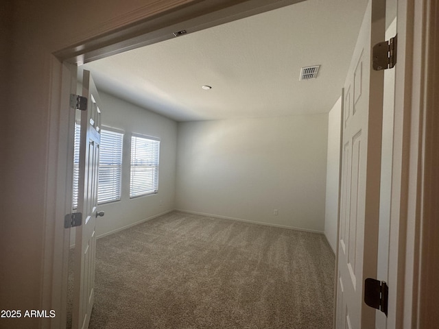 24627 W Ripple Rd, Buckeye, AZ 85326 - carpeted empty room featuring baseboards