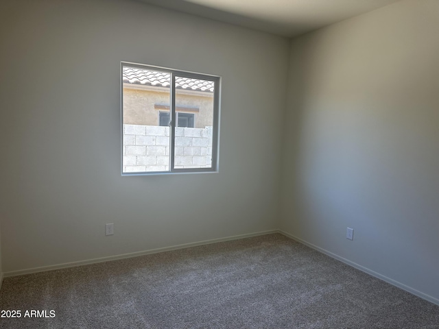 24627 W Ripple Rd, Buckeye, AZ 85326 - empty room featuring carpet and baseboards