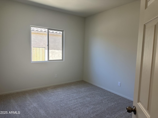 24627 W Ripple Rd, Buckeye, AZ 85326 - spare room featuring carpet and baseboards