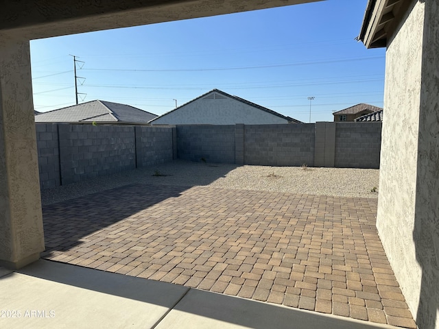 24627 W Ripple Rd, Buckeye, AZ 85326 - fenced backyard featuring a patio area