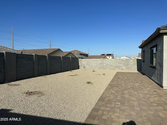 24627 W Ripple Rd, Buckeye, AZ 85326 - fenced backyard with a patio