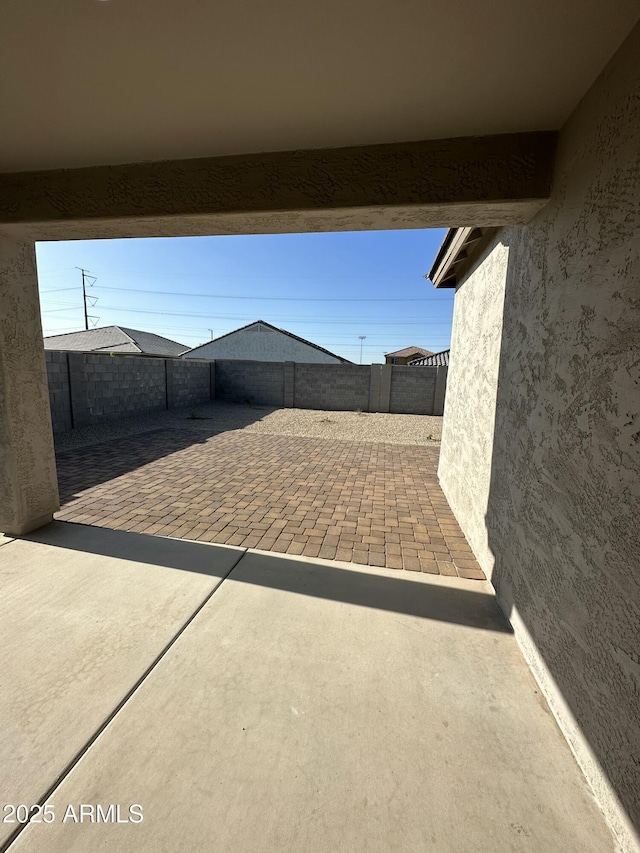 24627 W Ripple Rd, Buckeye, AZ 85326 - fenced backyard with a patio area
