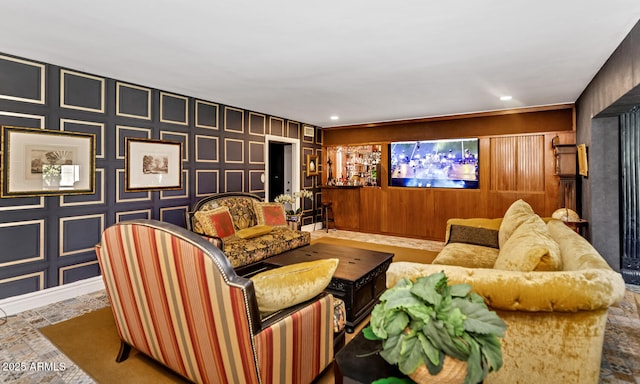 cinema room featuring recessed lighting and stone finish flooring