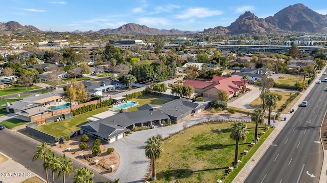 drone / aerial view featuring a mountain view