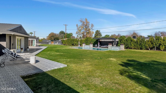 view of yard with a gazebo, french doors, a patio, and an outdoor pool