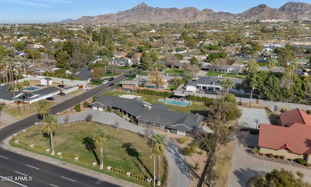 birds eye view of property featuring a residential view and a mountain view