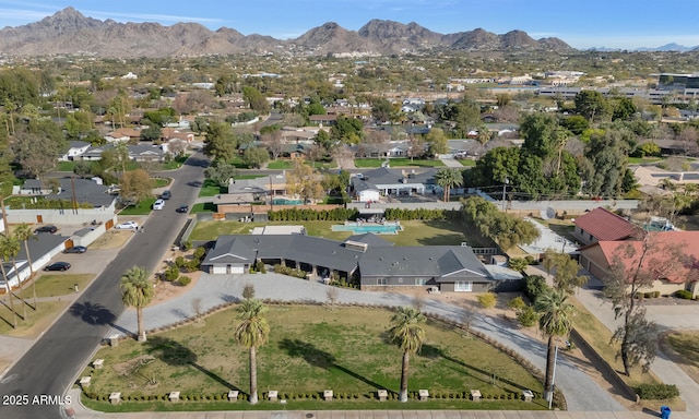 birds eye view of property with a residential view and a mountain view