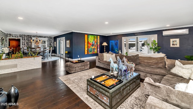 living room featuring recessed lighting, a wall mounted AC, ornamental molding, wood finished floors, and baseboards