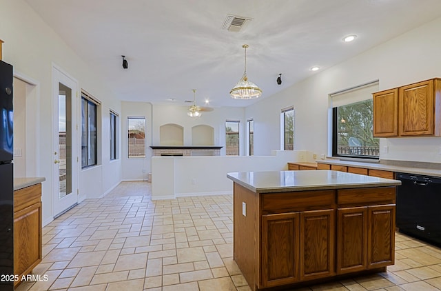 kitchen with light countertops, visible vents, dishwasher, and recessed lighting