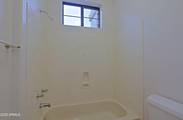 full bath with washtub / shower combination and toilet