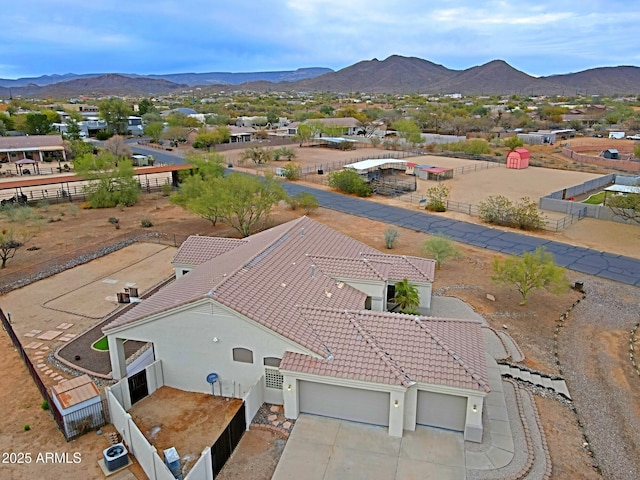 birds eye view of property featuring a mountain view