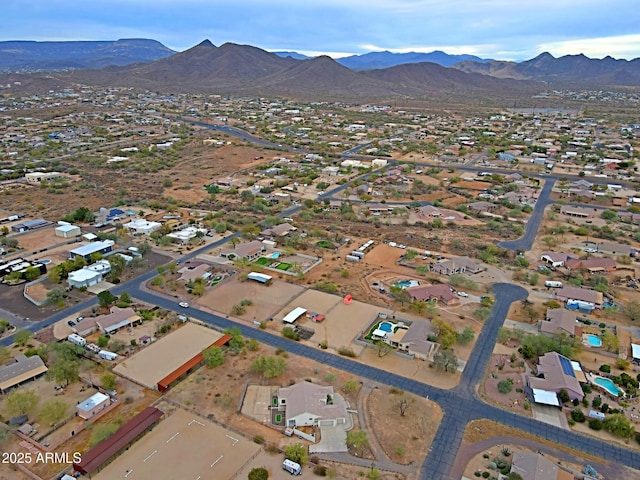 drone / aerial view with a residential view and a mountain view