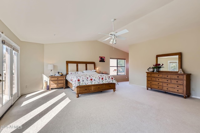 carpeted bedroom with ceiling fan, access to exterior, and lofted ceiling