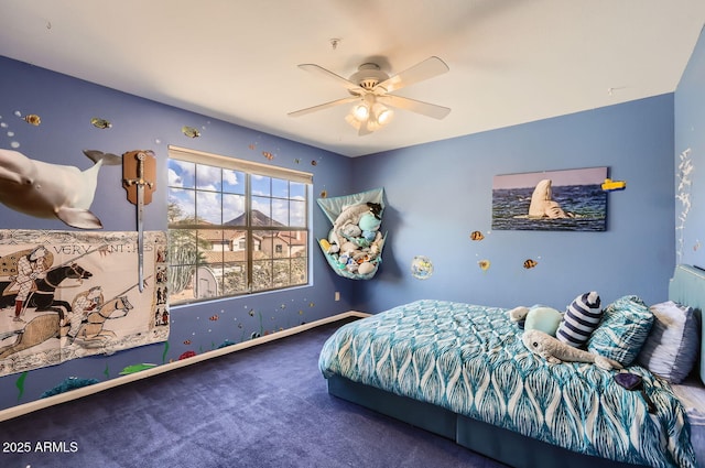 bedroom with ceiling fan and carpet flooring